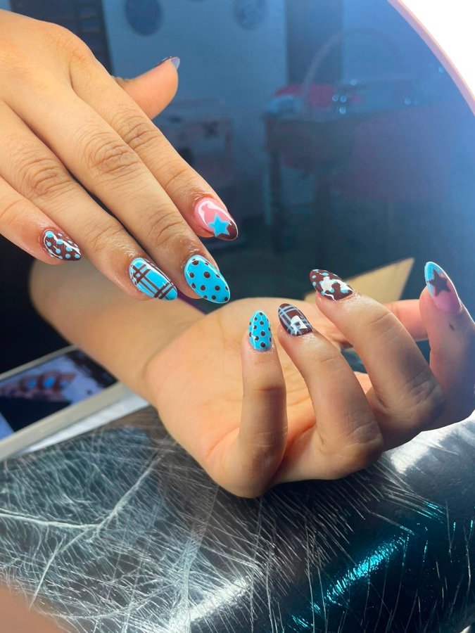 Turquoise and blue statement nail art
